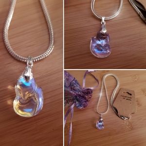 Carved White Rainbow Titanium Crystal Fox necklace on a stirling silver chain
